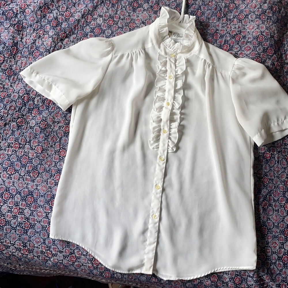White ruffle blouse